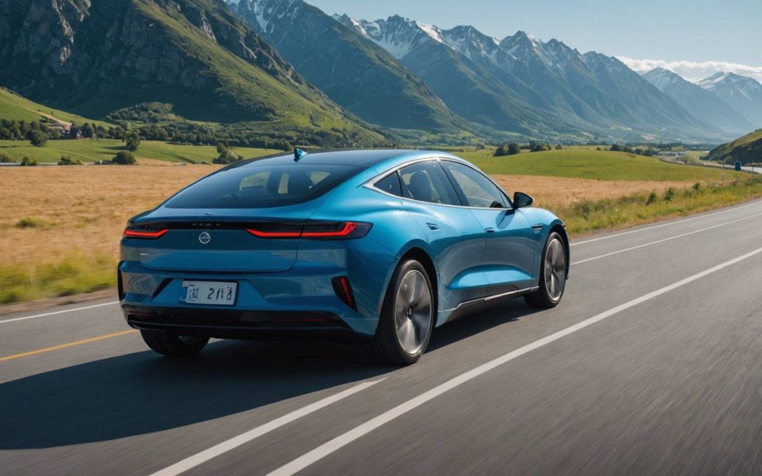 Electric car driving on a highway with mountains in the background and a clear blue sky.